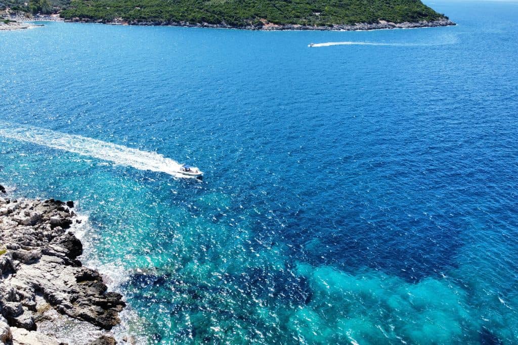 A boat coasting around the Ksamil islands.