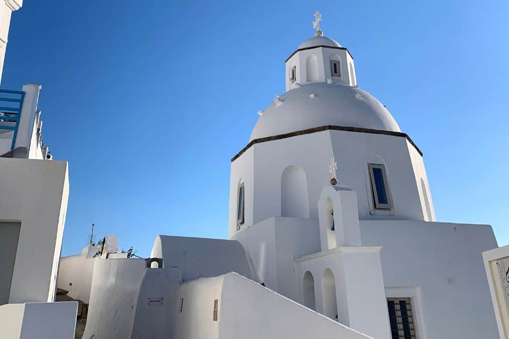 View of one of the domed churches in the village of Fira.